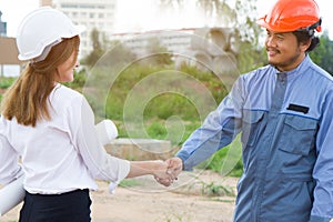 Construction teamwork. architect and engineer shaking hands