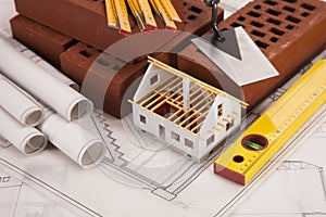 Construction tools on blueprints