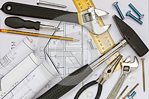 Construction tools and blueprints
