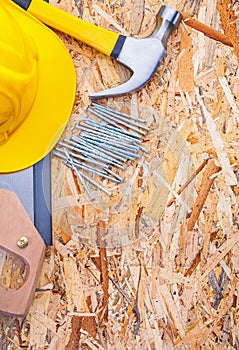 Construction tools helmet handsaw claw hammer
