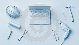 Construction tools, helmet and laptop, white