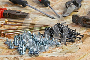 Construction tools pliers, hammer, shears, screwdriver, ommerce, screws