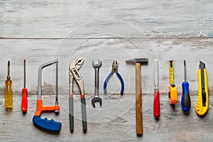 Construction tools on rustic wooden