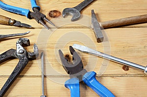 Construction tools ,  wooden background
