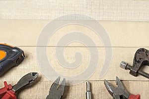 Construction tools on wooden background.Copy space for text.