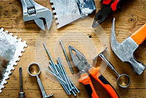 Construction tools on a wooden table