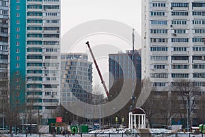 Construction with tower cranes in Moscow in everning