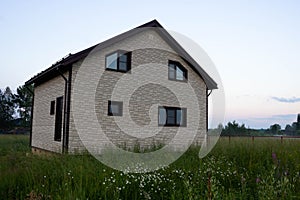 Construction of a traditional Russian dacha on a suburban plot of land