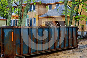 Construction trash dumpsters in an metal container, home house renovation