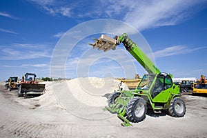 Construction vehicles at building site