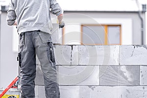 construction of a wall of a house made of aerated concrete blocks