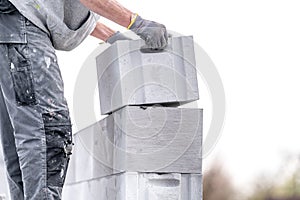 construction of a wall of a house made of concrete blocks