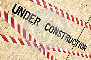 Construction warning on wood panels