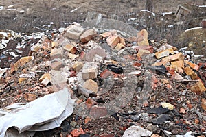 Construction waste with elements of various dismantled and destroyed old structures