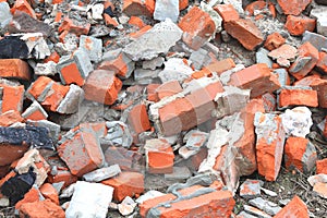 Construction waste with elements of various dismantled and destroyed old structures at landfill