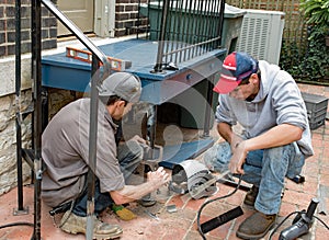 Construction Welder and Young Apprentice