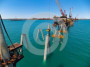 Construction of a wharf showing raked piles ready for headstock placement