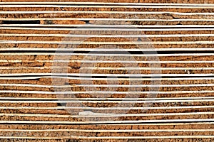 Construction Wood Texture Background: Weathered Cross Section of Piled Plywood Panels - Detail