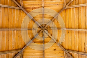 Construction of a wooden roof from the inside.