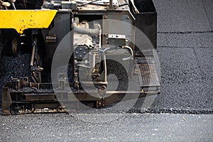 Construction work for road and highway repair,Concept: Transportation symbol for vehicle safety,Worker operating asphalt road