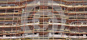 Construction work site with scaffold