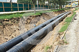 Construction work. Workers. Pipe laying. Repair of communications