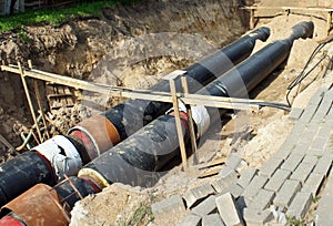 Construction work. Workers. Pipe laying. Repair of communications