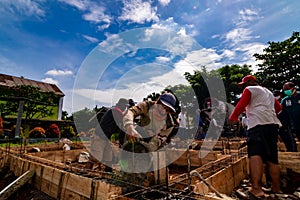 Construction worker at work under sunny weather