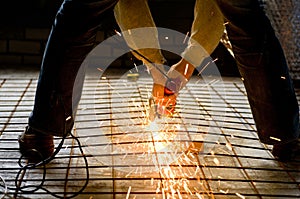 Construction worker with Angle Grinder