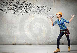 Construction worker announcing something