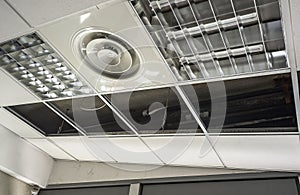 Construction worker assemble a suspended ceiling