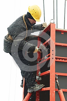 Construction worker assembling