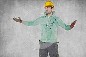 Construction worker breaks hands, gesture of powerlessness