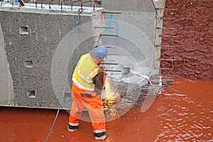 Construction worker with a bridge beam