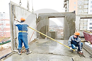 Construction worker. Builders concreter joiners at work