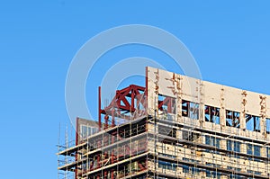 Construction worker building scaffold