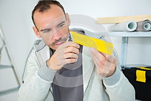 construction worker building timber frame in new home