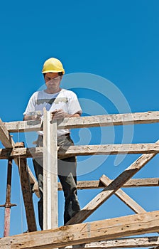 Construction worker busy on formwork preparation photo