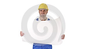 Construction worker checking blueprints on site on white background.