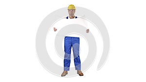 Construction worker checking blueprints on site on white background.