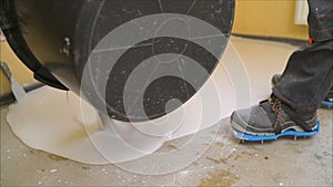 Filling the floor. Construction worker Concrete pouring during commercial concreting floors of building in construction site and