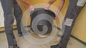 Filling the floor. Construction worker Concrete pouring during commercial concreting floors of building in construction site and