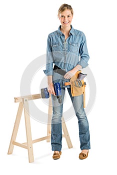 Construction Worker With Drill And Belt Standing By Work Horse