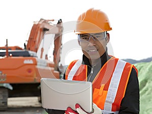 Construction worker and excavator