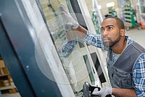 Construction worker fitting window