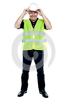 Construction worker in fluorescent jacket