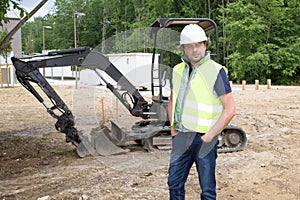 Construction worker with forklift truck