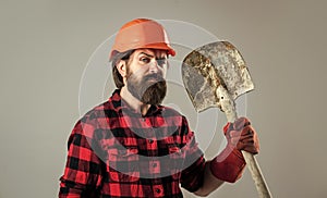 construction worker in hard hat. engineer architect in safety helmet. brutal technician builder. factory worker mechanic