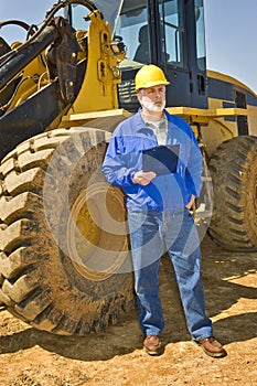 Construction Worker Holding Clipboard