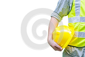 Construction worker holding hard hat with white background